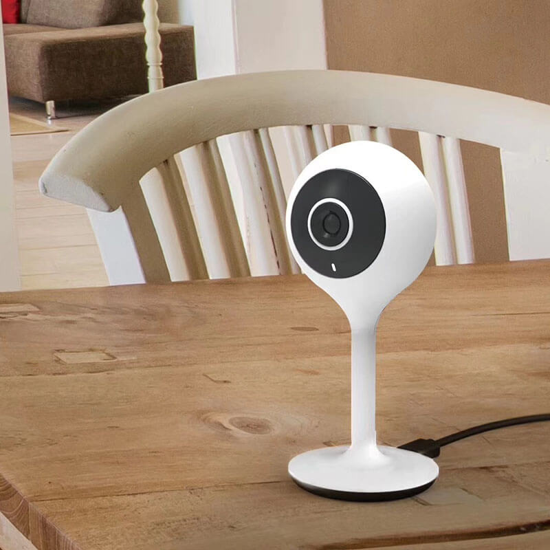 Compact Full HD 1080p WiFi Baby Monitor & IP Camera  on the table