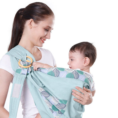 women hold her baby in the Soft & Breathable Baby Wrap Carrier 