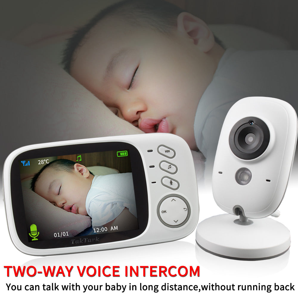 baby sleeping and the 3.2 Inch Digital Baby Monitor next to him