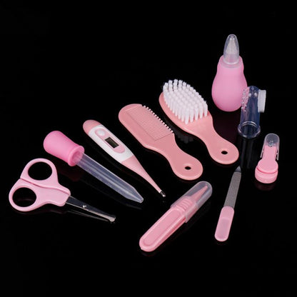 Pink Ultimate Baby Care Kit on black background