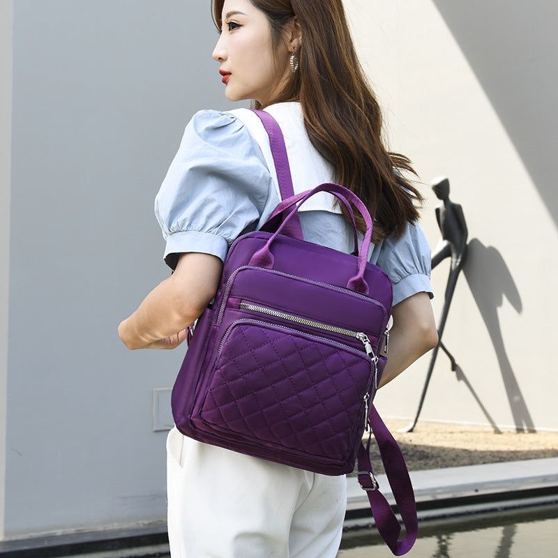 women hold on her shoulder Oxford Cloth Backpack