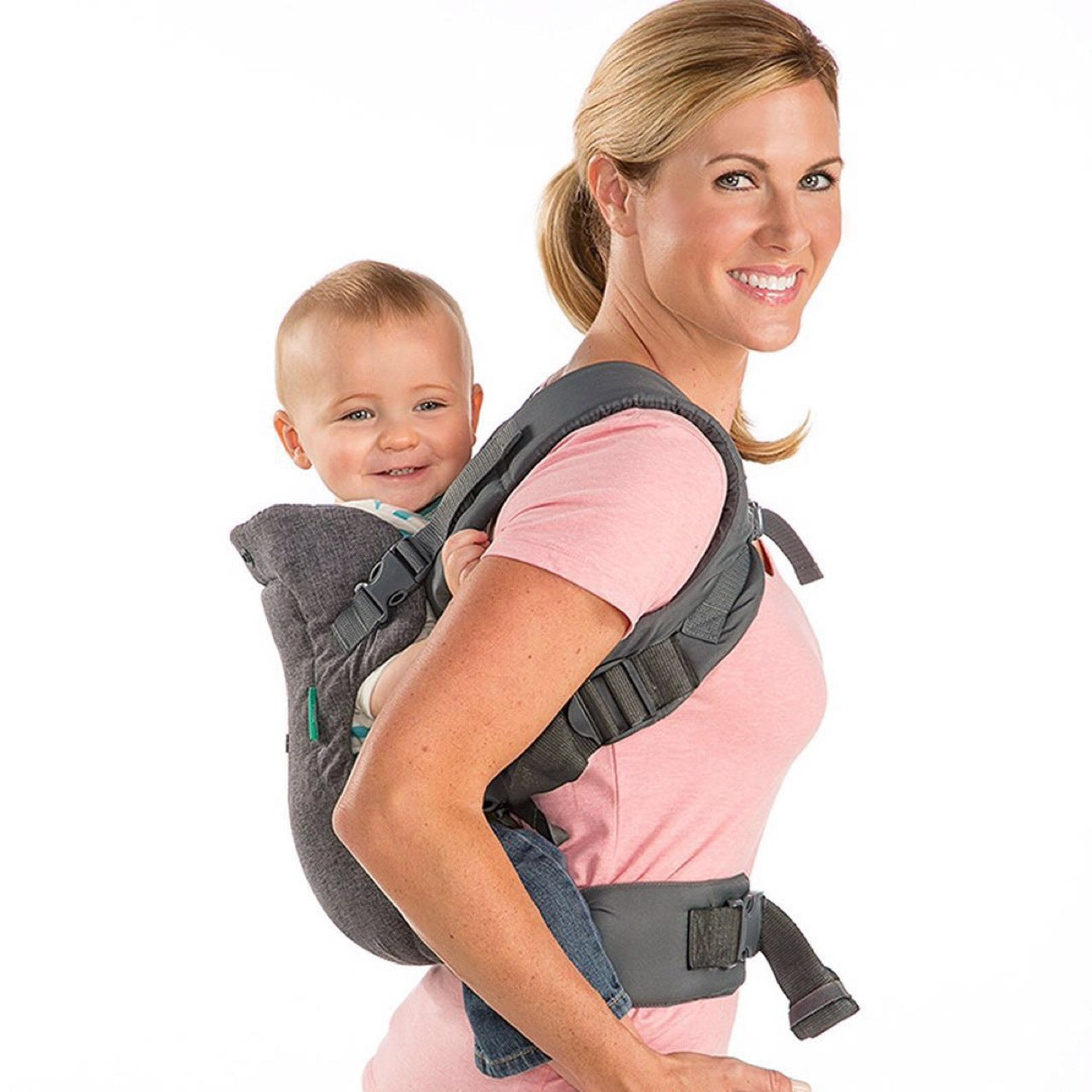 woem smike with her baby in Baby Carrier